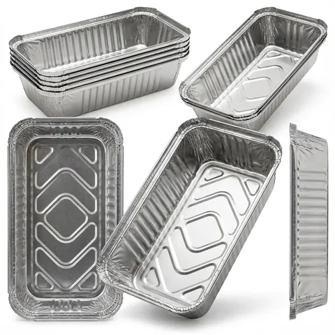 Deep oblong silver aluminium foil containers with ribbed sides and rolled rims, shown from above, at an angle, side-on and nested in a stack, without lids, foil tray, takeaway tray