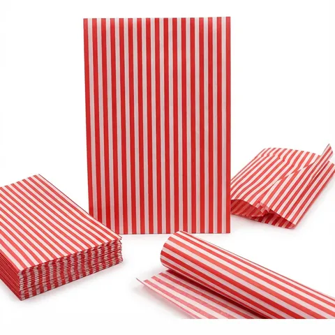 Red and white striped burger wrap sheets: one sheet laid flat, a stack of sheets, a folded sheet and a curled sheet, burger paper, sandwich wrap