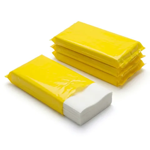 Packs of white chicken box liner sheets wrapped in yellow film, one pack open to show the stacked sheets, fried chicken box, chicken bucket