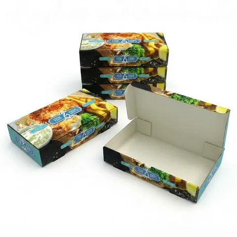 Stack of 12 inch fish and chips boxes printed with battered fish, chips and mushy peas, one open to show the white inside and hinged lid, chip box, chippy box