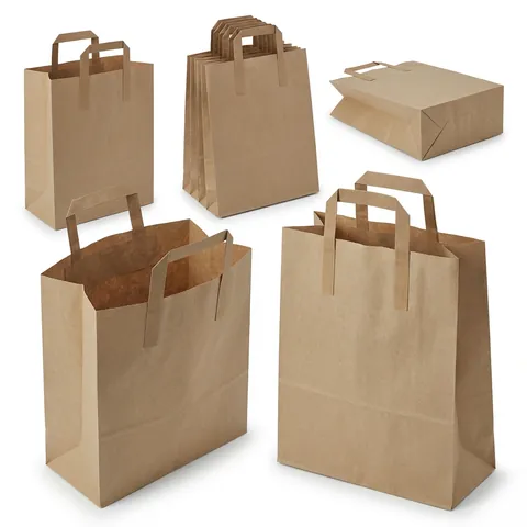 Medium brown kraft paper bags with flat paper handles, two standing open, one lying flat and a stack of folded bags, kraft bag, brown paper bag