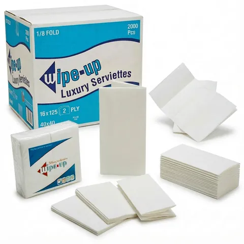 White 2-ply serviettes in 1/8 fold, a wrapped pack and loose folded napkins in front of a printed case marked 2000 pieces, paper napkin, table napkin