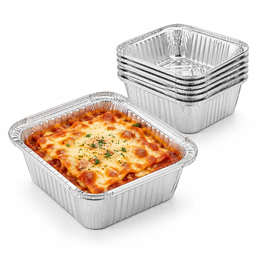 No2 aluminium container filled with lasagne with a stack of containers behind